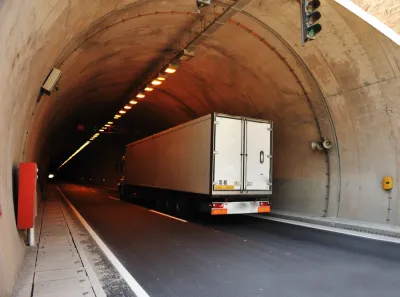 Truck is driving into tunnel in Switzerland